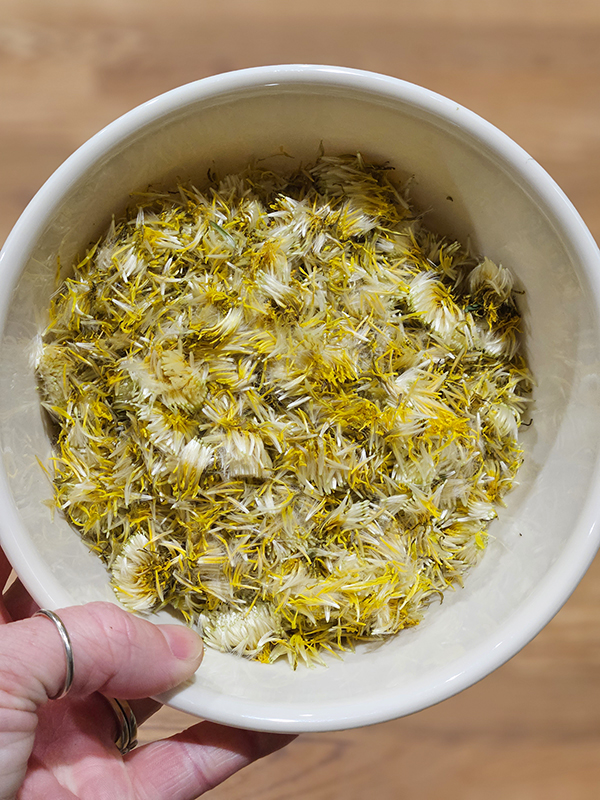 A bowl full of yellow petals
