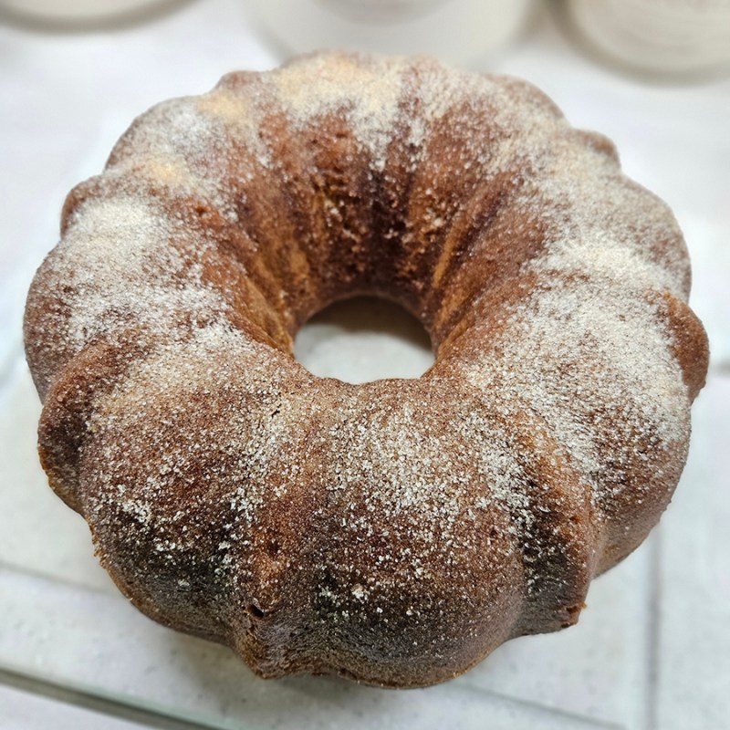 A baked apple cider doughnut cake
