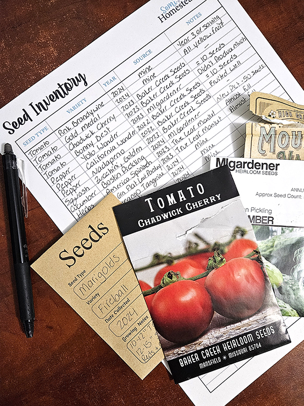 Multiple seed packets and a seed inventory list