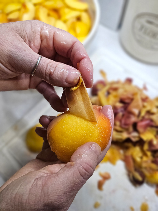 Peeling peaches before canning
