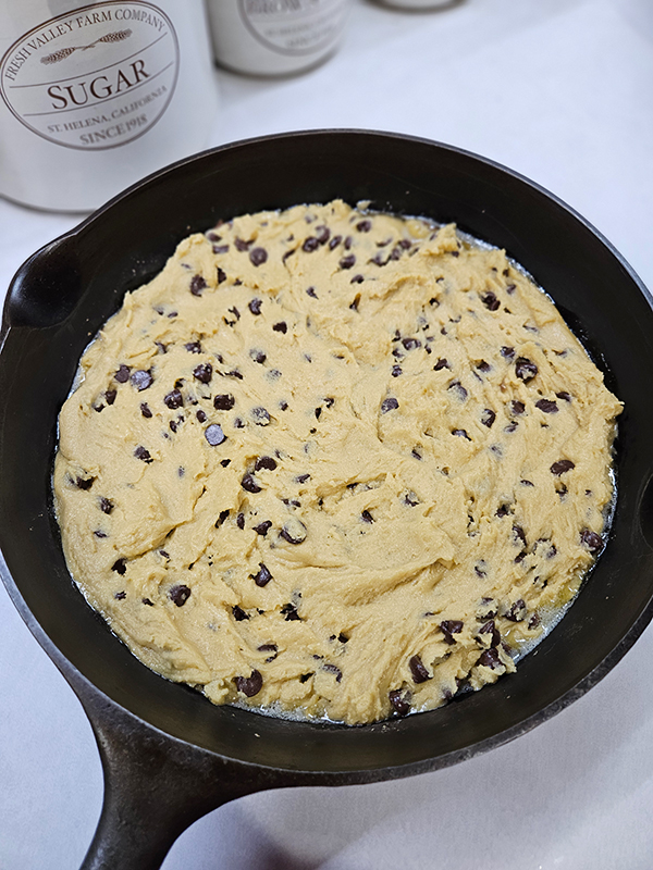 The chocolate chip cookie dough in the skillet