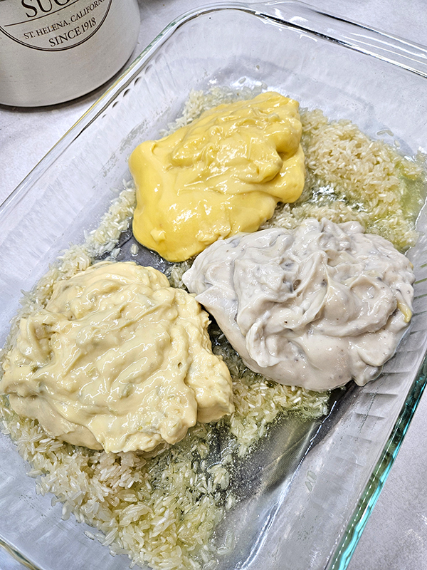 Adding the soup to the easy chicken and rice casserole before baking