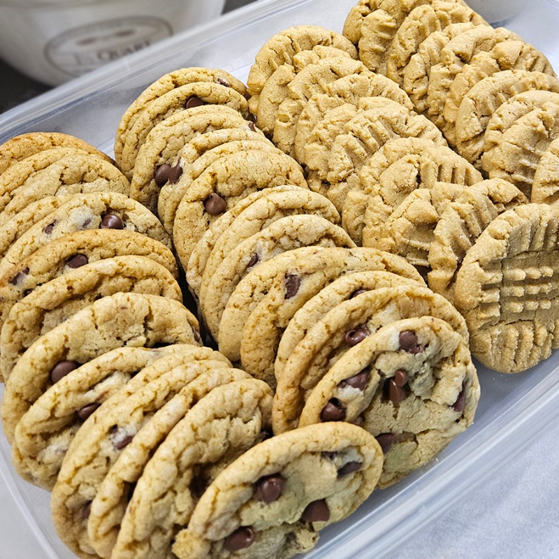 A container of chocolate chip and peanut butter cookies - Christmas Goodies