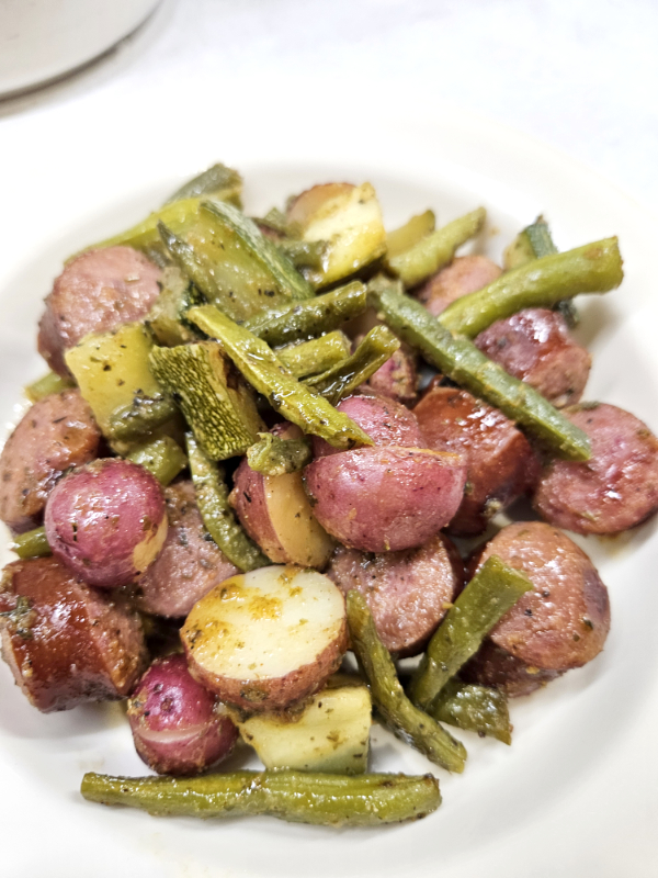 A place of Foil-Wrapped Sausage and Vegetables