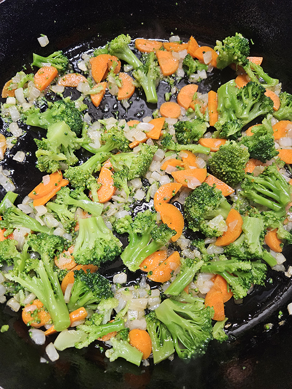 Sauteing vegetables in a cast iron skillet