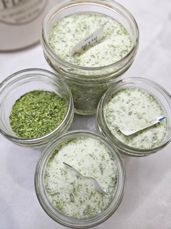 four jars of dried coarse garlic scape salt
