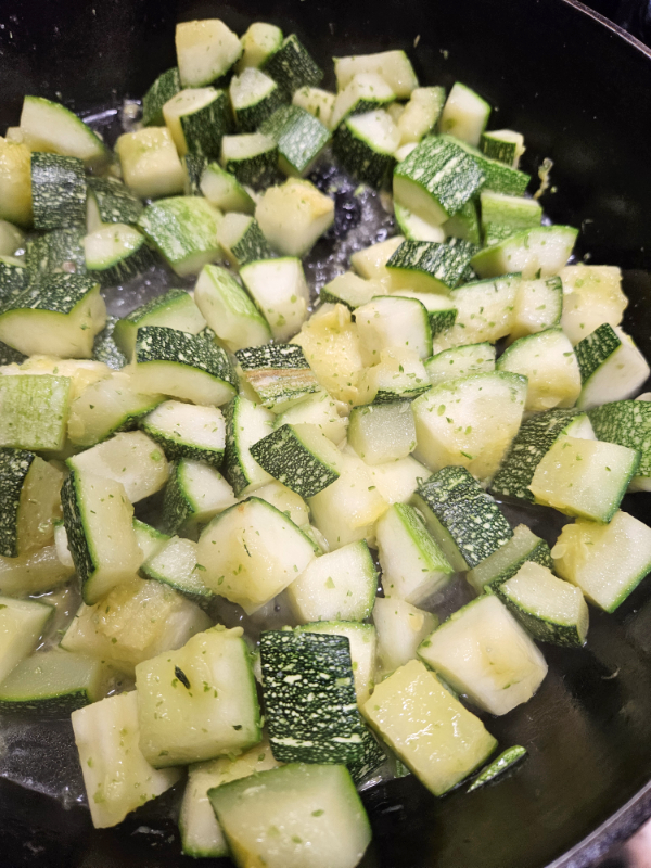 sauteed garlic butter zucchini with coarse garlic scape salt seasoning