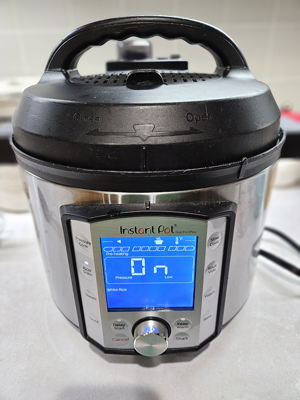 An instant pot cooking White Rice