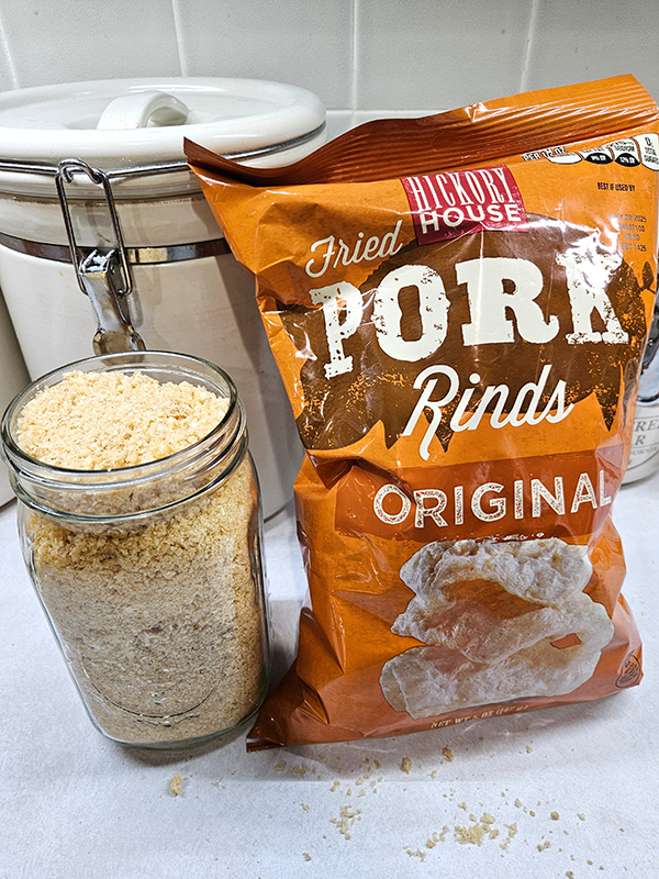 a jar of pork panks next to a bag of pork rinds - pork panko crispy chicken tenders