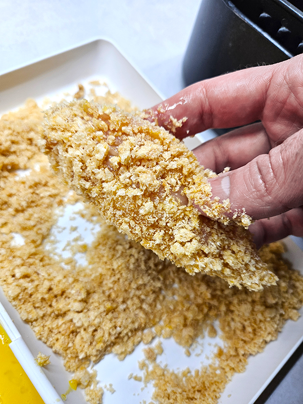 A breaded chicken tender