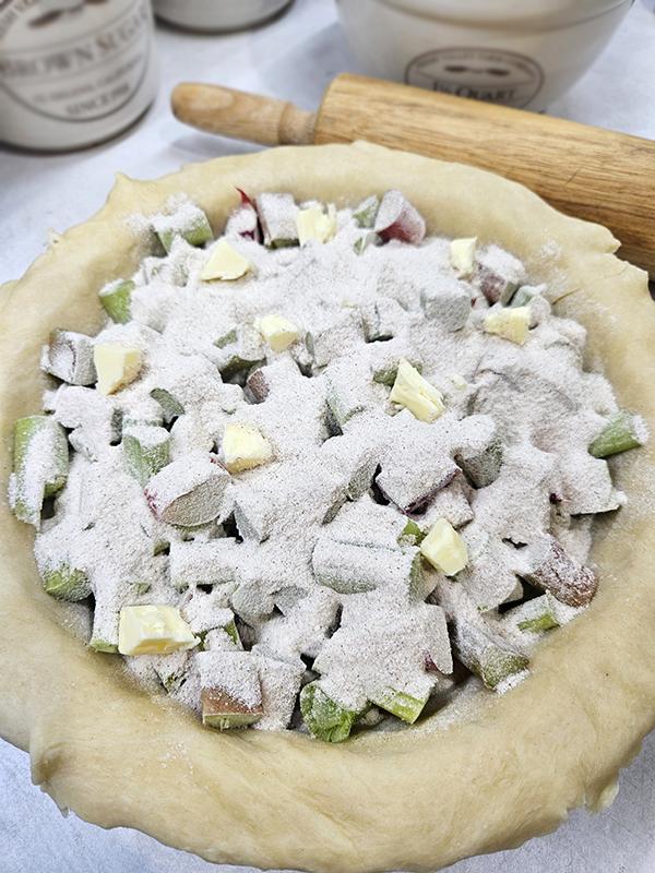 The flour mixture and dotted butter - homemade rhubarb pie