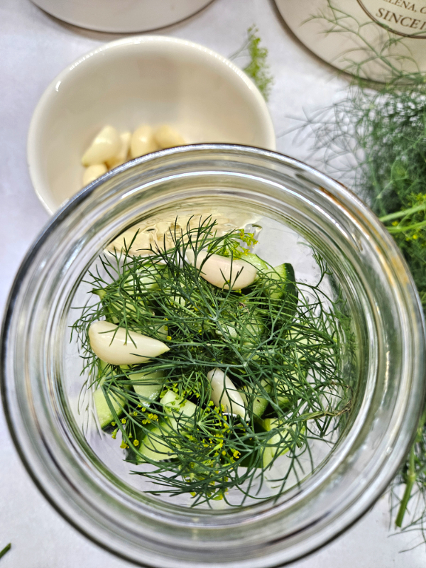 A canning jar with dill and garlic - Safe Canning Resources
