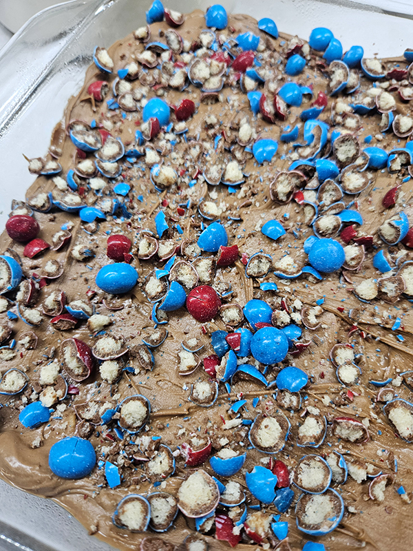 Crushed red and blue candy pieces on the scotcheroos