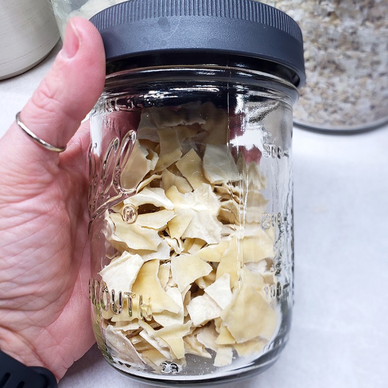 dry sourdough starter in a glass jar