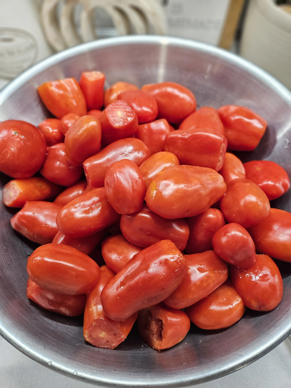 A bowl of trimmed San Marzano tomatoes