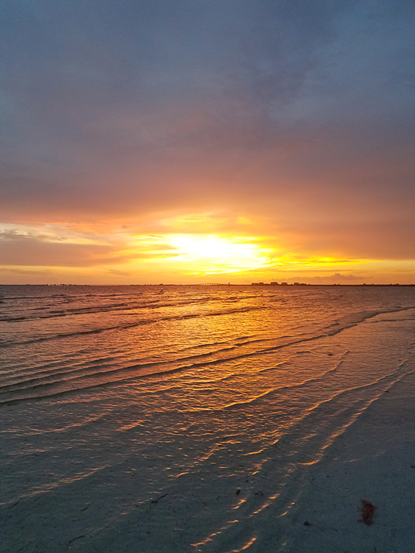 A sunset on a beach